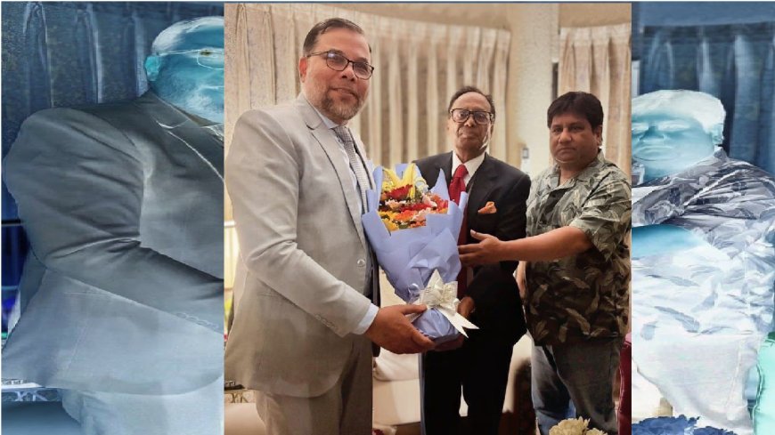 Fakir Mahbub Anam Swapan receives floral greetings from two secretaries